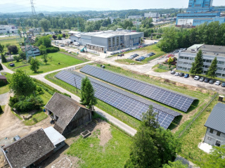 Aerial view of the Improdex (in the background) and PV farm